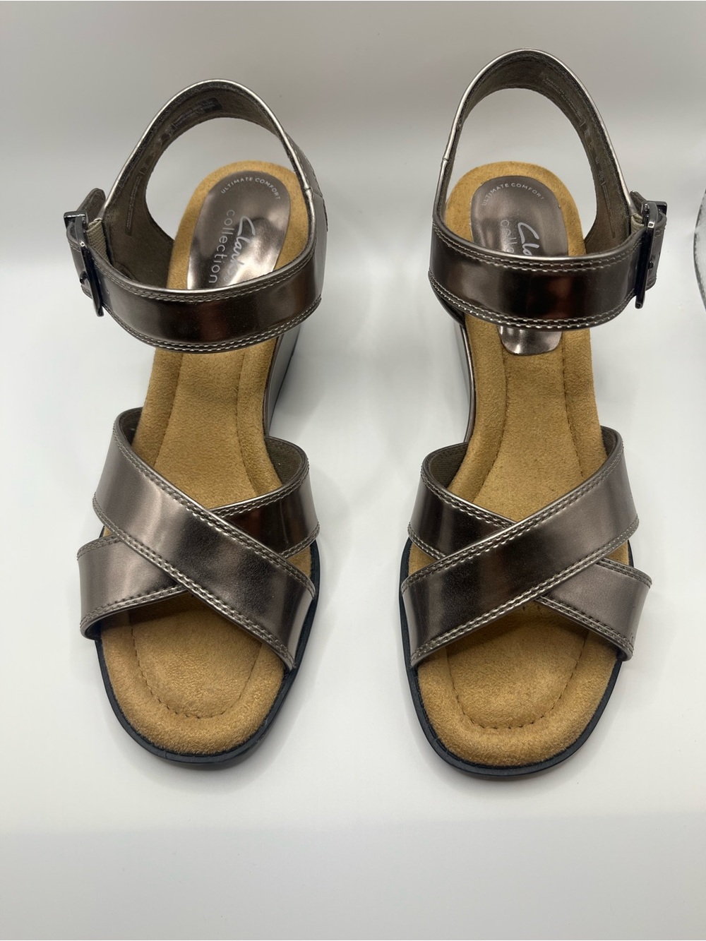 Clarks Bronze Metallic Crisscross Wedge Sandals